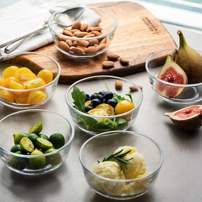 Dessert Bowl Set with six glass bowls filled with fruits, nuts, and ice cream on a kitchen counter. Perfect for serving or meal prep at Bamagate.com.