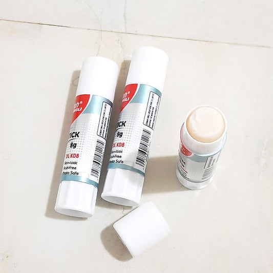 Open DL Glue Stick 8 g showing adhesive texture, perfect for school projects and crafts. Affordable price at Bamagate.com Sri Lanka.