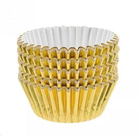 Stack of gold foil cupcake liners with white inner lining, ideal for baking cupcakes and muffins. Buy online at Bamagate.com in Sri Lanka.