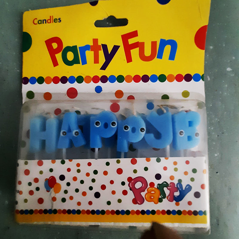 Happy Birthday Letter Candle in blue with googly eyes, perfect for decorating birthday cakes. Best birthday decoration in Sri Lanka.
