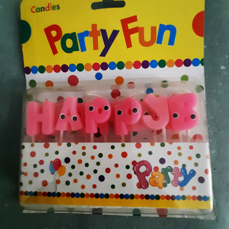 Pink Happy Birthday Letter Candle set with fun googly eyes, ideal for birthday cake decoration. Buy party supplies in Sri Lanka.