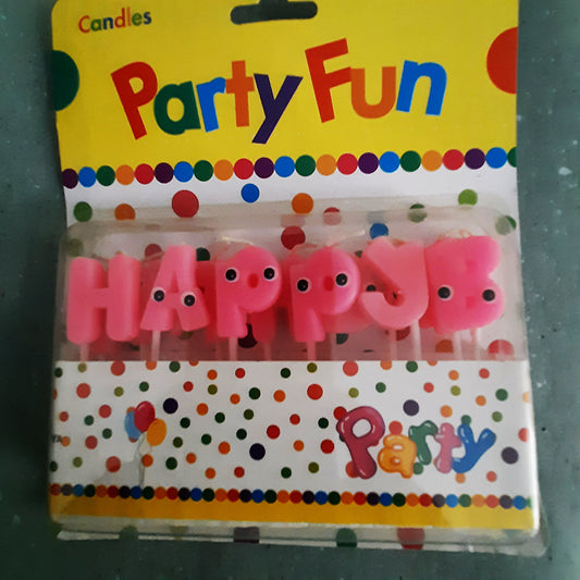 Pink Happy Birthday Letter Candle set with fun googly eyes, ideal for birthday cake decoration. Buy party supplies in Sri Lanka.