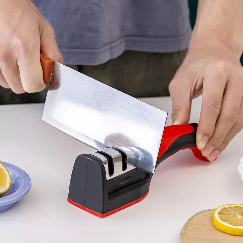 User sharpening a cleaver with Knife Sharpener Tungsten Steel featuring a non-slip base. Knife Sharpener Sharpening Stone | Price in Sri Lanka.