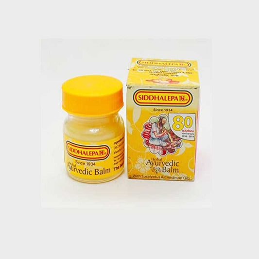 Siddhalepa Balm 5g jar and box for pain and cold relief with herbal ingredients like eucalyptus and cinnamon oils. Ideal for headaches and flu symptoms.